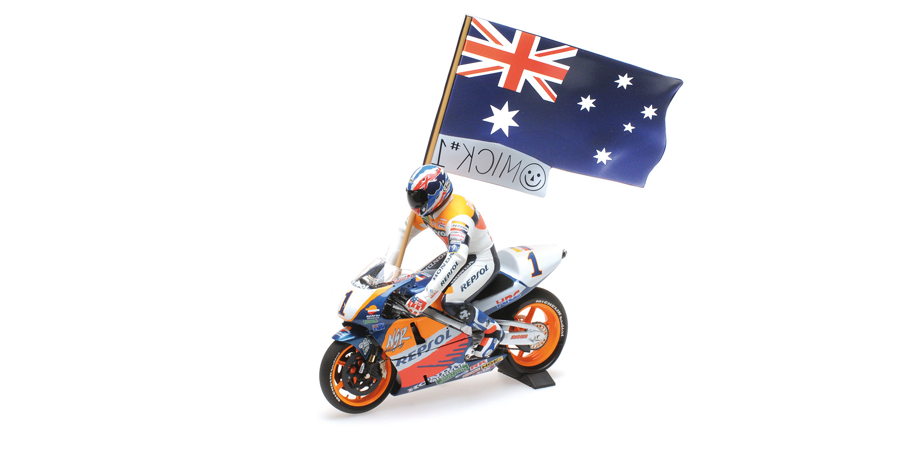 HONDA NSR 500 - MICK DOOHAN - GP 1995 - SET WITH FIGURINE AND FLAG