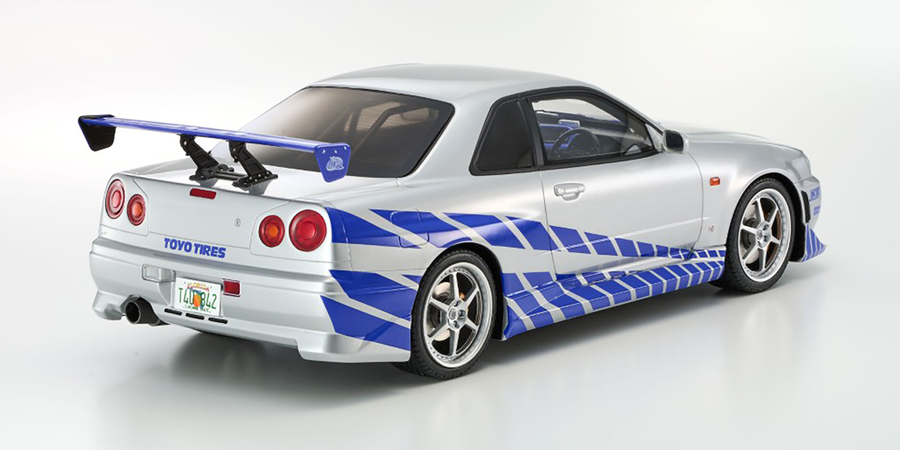 NISSAN SKYLINE R34 GT-R 2001 - FAST & FURIOUS - SILVER W/BLUE STRIPES (KSR12007A)